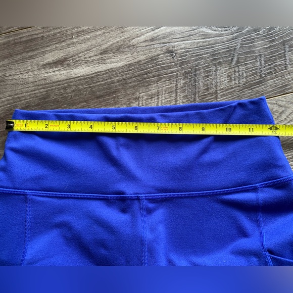 Fabletics Powerhold Royal Blue Cropped Leggings w/ mesh side cutout and pockets - Picture 8 of 8